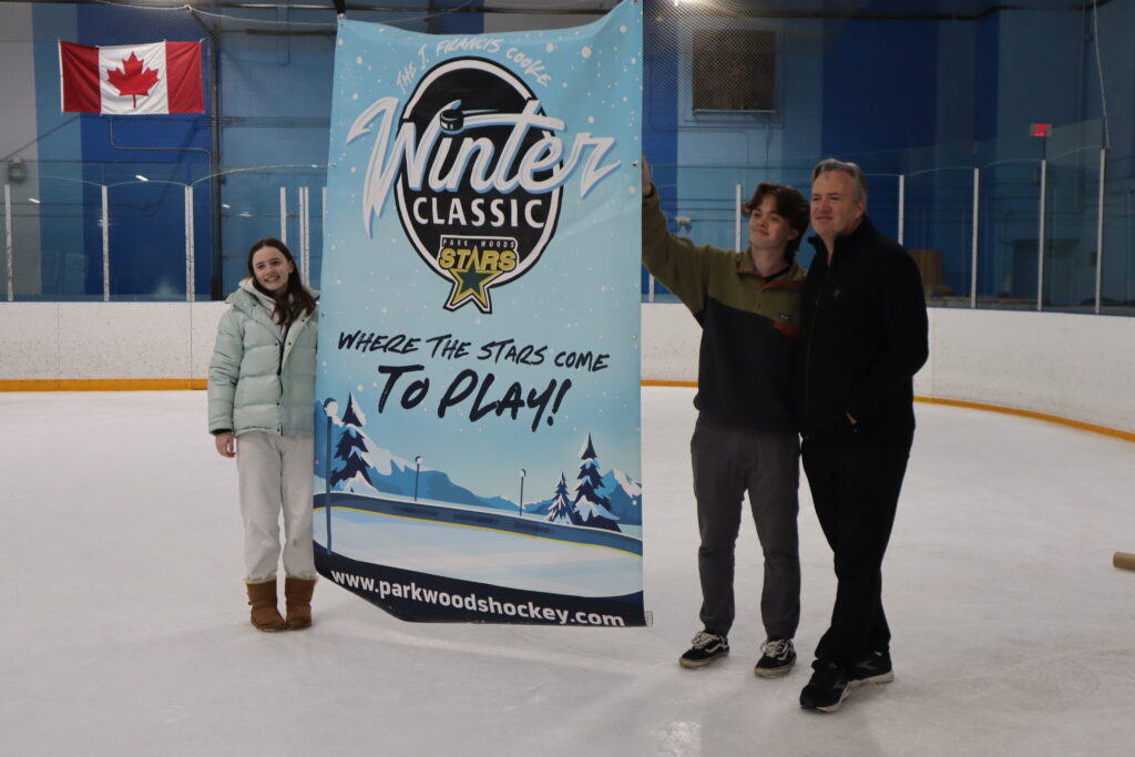 Francis Cooke with the new Winter Classic banner